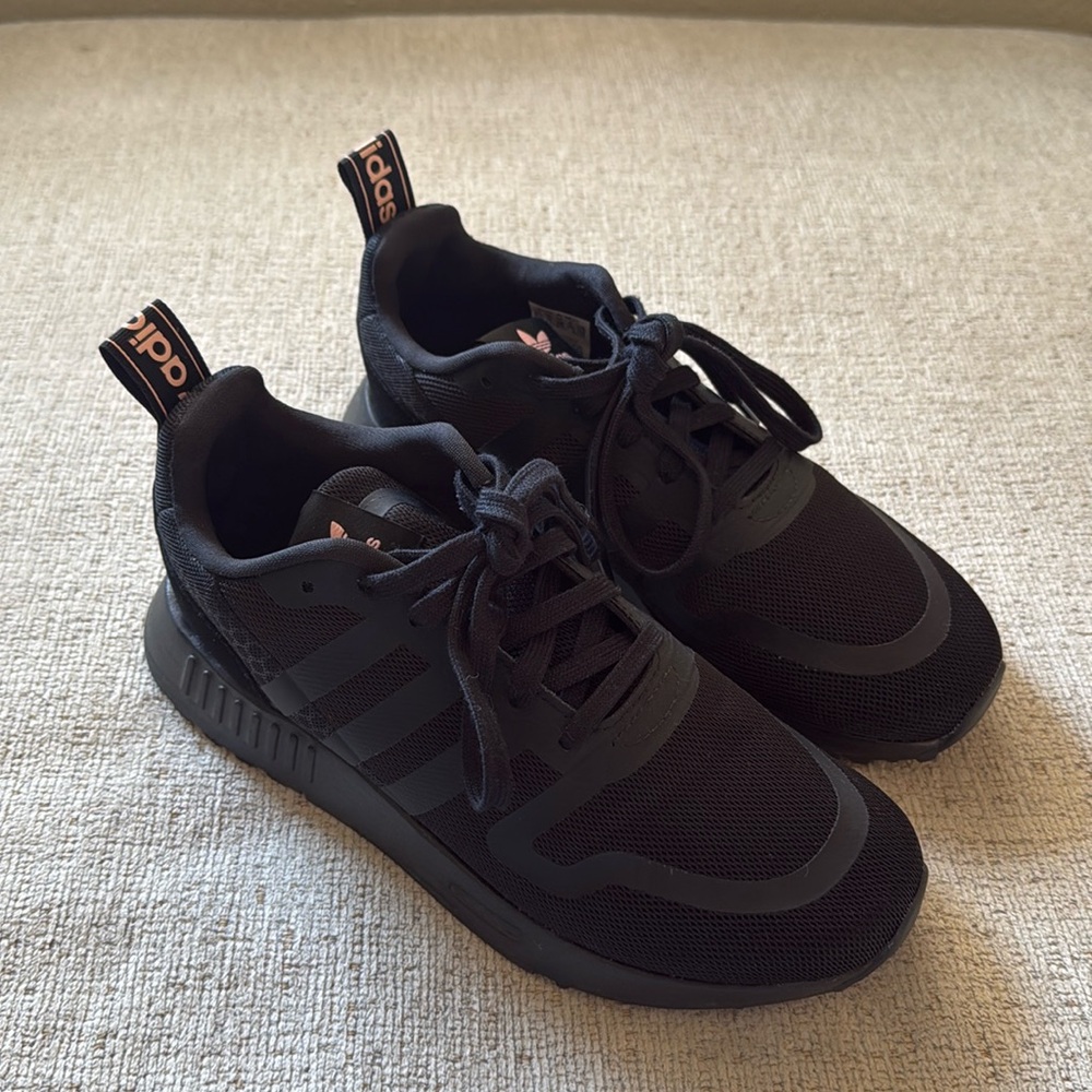 Women’s Adidas, Black and Pink. Barely worn. Size 6.5.